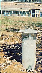 The intake ends of the cool tubes are capped with screens and shields to keep rain out.